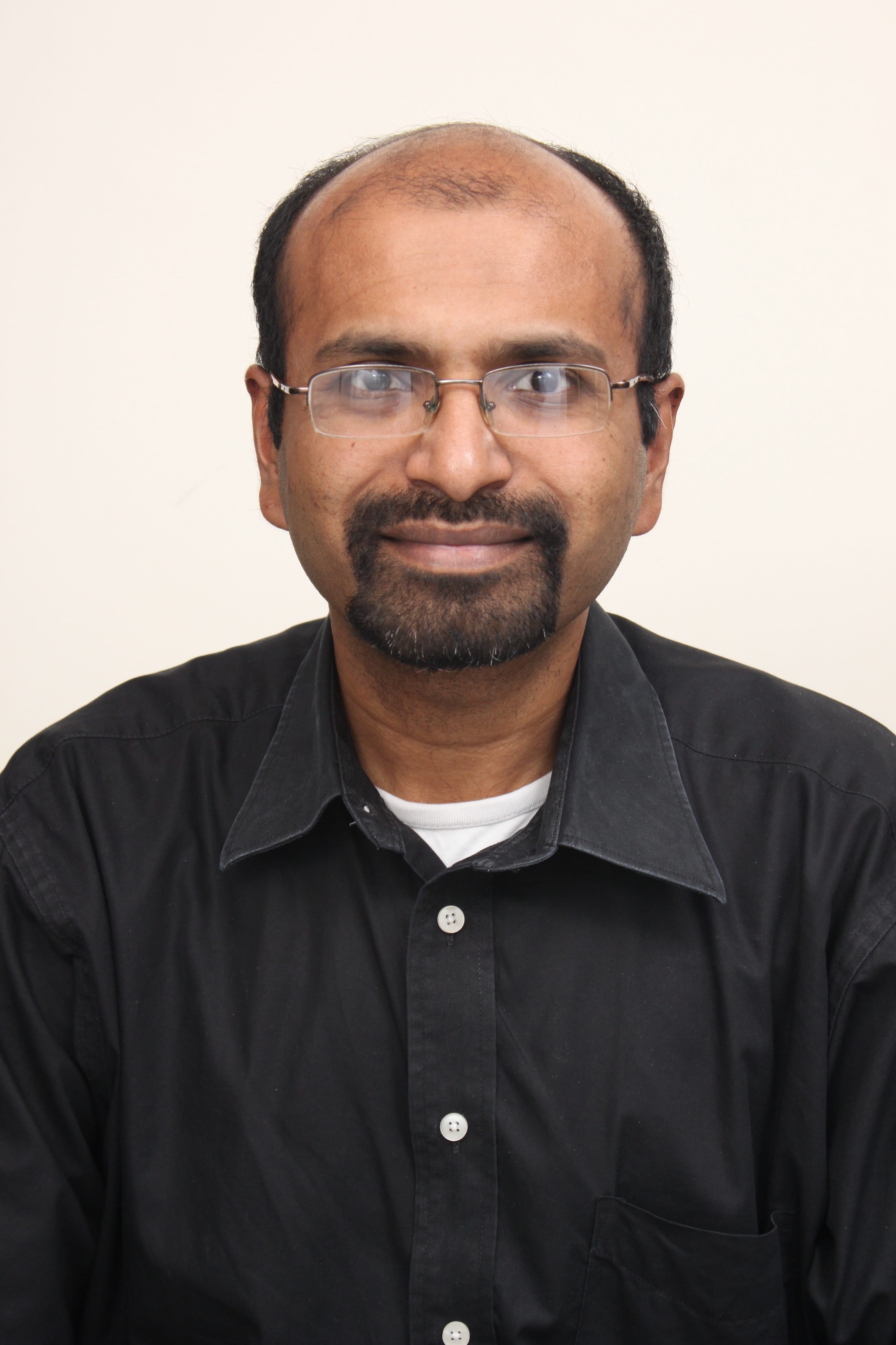 Dr. Santosh Varughese